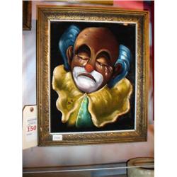 Clown painted on framed black velvet