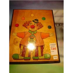 oil on wood of juggling clown