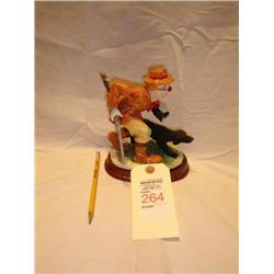 Hunting clown figurine