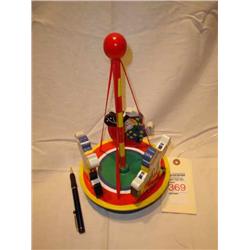 wood toy clown spinning around may pole