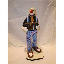 Ceramic clown playing accordian