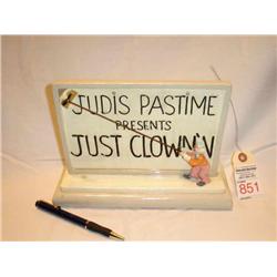 Clown cleaning sign
