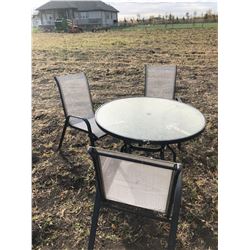 ROUND GLASS TABLE C/W 3 CHAIRS (PHONE:  780-220-5518)