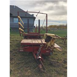 NEW HOLLAND 1002 BALE WAGON (PHONE:  780-699-8774)