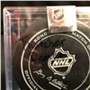 Image 2 : THATCHER DEMKO OFFICIAL GAME PUCK AUTOGRAPHED VANCOVUER CANUCKS PUCK