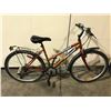 Image 2 : 2 BIKES - BLUE CCM 24-SPEED FRONT SUSPENSION HYBRID CRUISER BIKE, RED SUPERCYCLE 18-SPEED ROAD BIKE