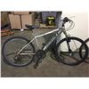 Image 2 : 2 BIKES - GREY CCM 21-SPEED FRONT SUSPENSION MOUNTAIN BIKE, SILVER NAKAMURA 18-SPEED FRONT