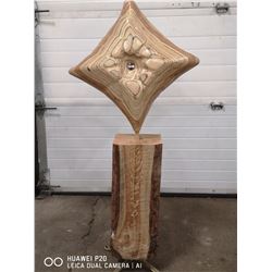 LAMINATED WOOD PILLOW AND STAND ART PIECE. MADE