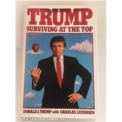 1990 SIGNED COPY OF DONALD TRUMPS "SURVIVING AT
