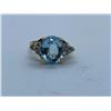 Image 1 : 14K RING WITH PALE BLUE STONE AND WHITE STONES