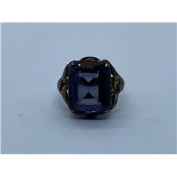 10K RING WITH MAUVE STONE