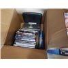 Image 2 : Box of DVDs and DVD player with hot wheels slot car track