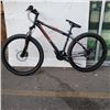 Image 1 : BLACK AND ORANGE MONGOOSE BIKE