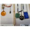 Image 2 : 7 NECKLACES ON STAND