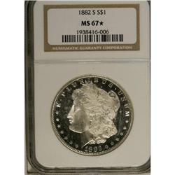 1882-S S$1 MS67 S NGC. This essentially brilliant Sup 