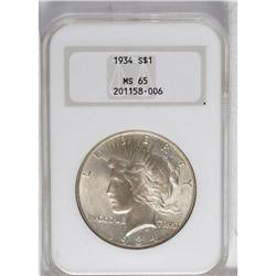 1934 S$1 MS65 NGC. The highly lustrous surfaces of thi 