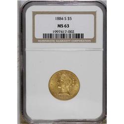 1884-S $5 MS63 NGC. A yellow-gold example with peach u 
