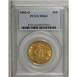 1892-O $10 MS62 PCGS. A lustrous peach-gold example, t 