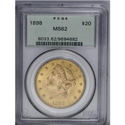 1898 $20 MS62 PCGS. A nicely struck yellow-orange exam 