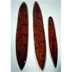 A COLLECTION OF THREE CENTRAL AUSTRALIAN CEREMONIAL BOARDS (bullroarer)