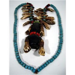 AN OLD KONYAK BODY ORNAMENT