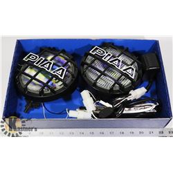 PIAA 6 1/2 DRIVING LIGHTS NEW WITH HARNESS
