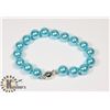 Image 1 : #132-SEA SHELL PEARL BRACELET 10mm/ 8"