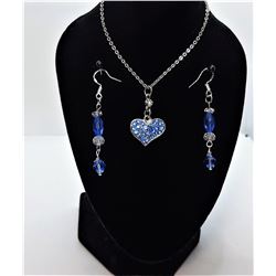 22)  SILVER TONE & PALE BLUE PAVE SET