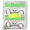 Image 1 : TWO NEW HANDCUFFS WITH KEYS