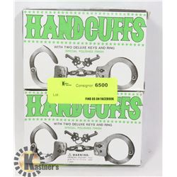 TWO NEW HANDCUFFS WITH KEYS