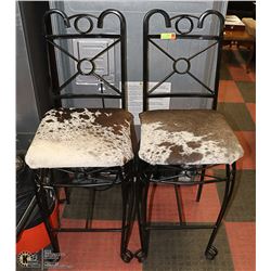 2 GENUINE COWHIDE AND METAL BAR STOOLS