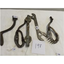 wood stove lifters, old wrench, clothes line pulley (wood)