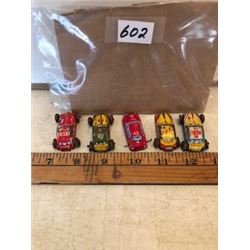 Lot of 5 tiny litho tin cars, 1950's