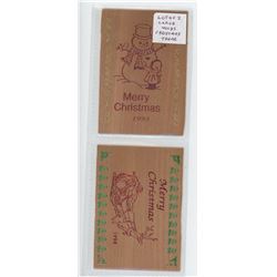Lot of 2 different large rectangular Christmas wooden nickels. Includes 1993 Snowman and 1994 Santa’
