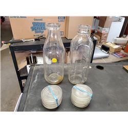2 MILK BOTTLES  & 12 GLASS CANNING SEALERS