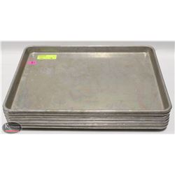 STACK OF SEVEN HALF-SIZE ALUMINUM BUN PANS
