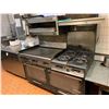 Image 1 : Garland Commercial double oven range with griddle and 4 burners. includes salamader -THE BUYER IS RE