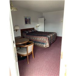 Motel Guest Room number: 19 includes as pictured: armoire dresser, desk with chair, luggage bench, W