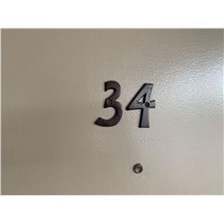Motel Guest Room number: 34 includes as pictured: armoire dresser, desk with chair, luggage bench, W