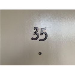Motel Guest Room number: 35 includes as pictured: armoire dresser, desk with chair, luggage bench, W