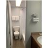 Image 9 : Motel Guest Room number: 36 includes as pictured: armoire dresser, desk with chair, luggage bench, W
