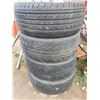 Image 2 : 4 Rims and Tires w/ Center Caps, Lugnuts ( 3 Tires Matching Tread Pattern)