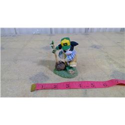 JOHN DEERE ORNAMENT OF BLACK AND WHITE CALF SHOVELLING "A NEW HOME WITH ROOM TO GROW"