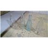 Image 1 : 4 CLEAR COKE BOTTLES TALLER ONE BLUISH IS SLIGHTLY CRACKED CHIPPED