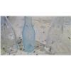 Image 3 : 4 CLEAR COKE BOTTLES TALLER ONE BLUISH IS SLIGHTLY CRACKED CHIPPED