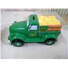 Image 4 : JOHN DEERE PIGGY BANK IN ITS GREEN TRUCK WITH YELLOW HAY BALES STOPPER MISSING FROM BOTTOM