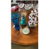 Image 1 : BLUE GLASS VASE, GLASS BOTTLE WITH LID, EASTERN ARTIFICIAL FLOWER AND SMALL PLATE