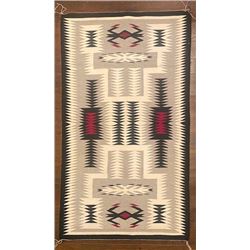 Navajo Storm Pattern Weaving measuring 57 ¾-inches by 34-inches