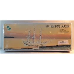 23)  FACTORY SEALED MODELS OF 2 WOODEN