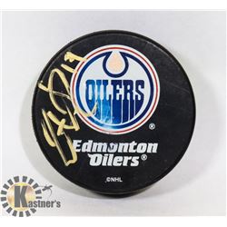 JUSTIN SCHULTZ AUTOGRAPHED EDMONTON OILERS PUCK